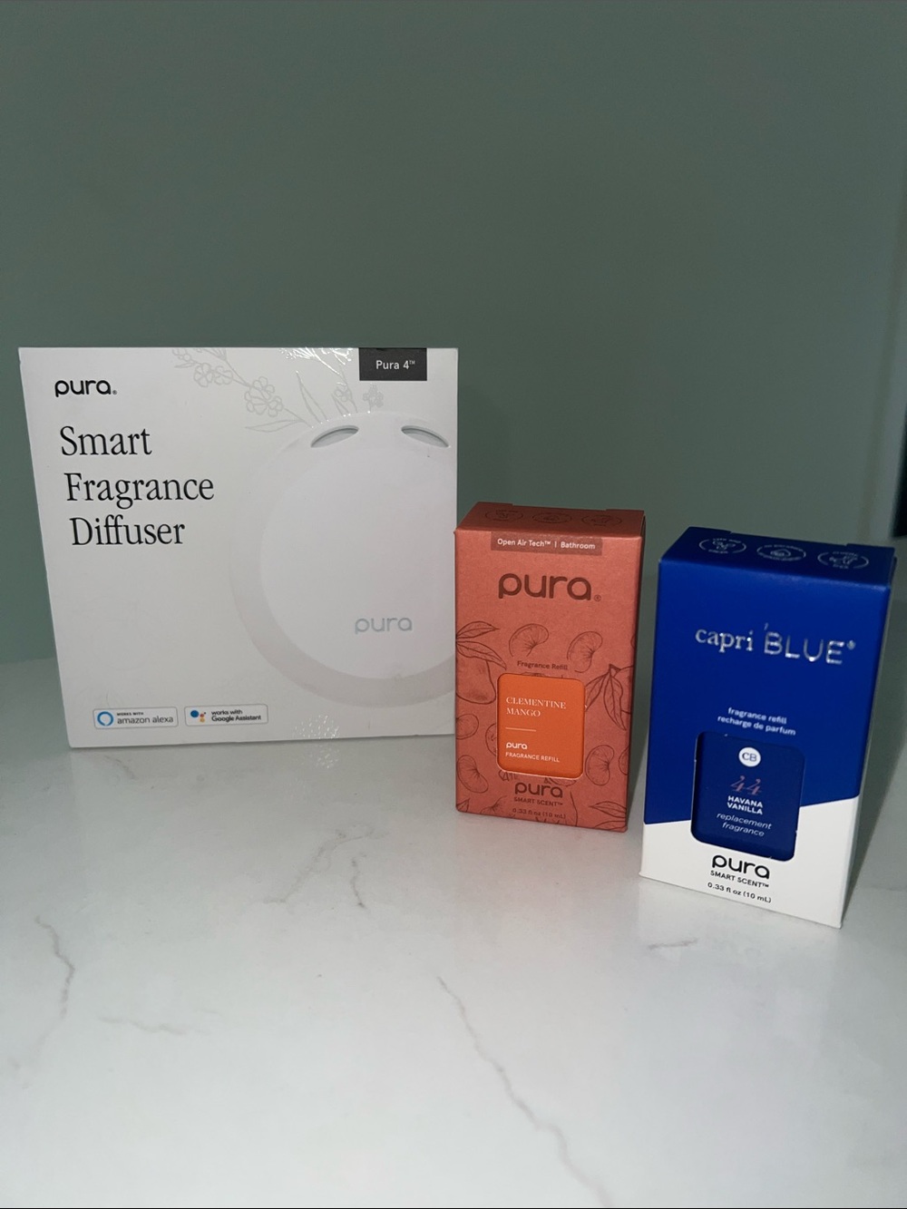 Pura Smart Fragrance Diffuser with Orange Clementine & Blue Capri Blue Refills